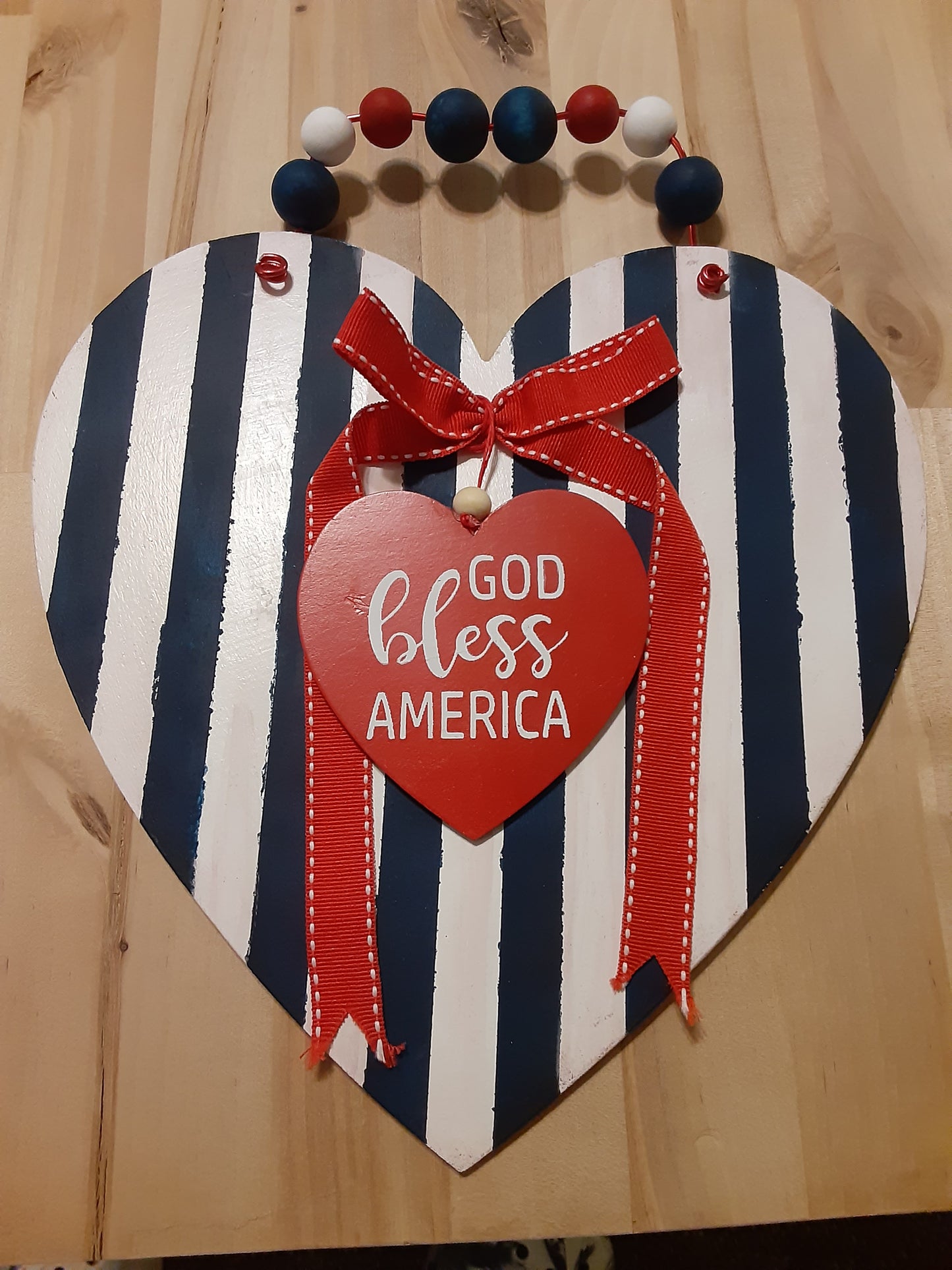 Blue and White Striped Heart Sign